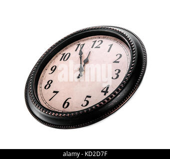 Horloge murale ancienne sur un fond blanc. Banque D'Images