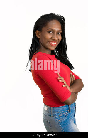 Woman with arms crossed side view Banque D'Images