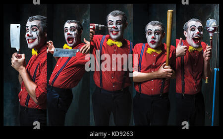 La scary clown tenant un couteau sur dack halloween concept. Banque D'Images