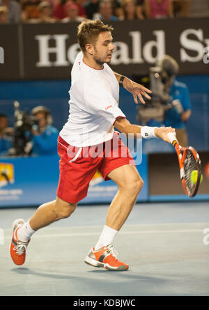 Stanislaus Wawrinka de Suisse a battu le premier joueur dans le monde R. Nadal d'Espagne pour réclamer le 2014 Open d'Australie hommes Singles champ Banque D'Images