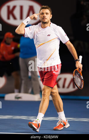 Stanislas Wawrinka, de Suisse, célèbre après avoir gagné sa première finale du Grand Chelem, la huitième graine dépassant T. Berdych of Banque D'Images