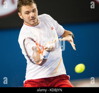 Stan Wawrinka en action contre N Djokovic à l'Open d'Australie Banque D'Images