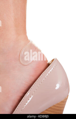 Close up de bandage sur talon femme Banque D'Images