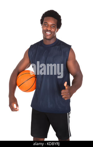 Basket-ball avec thumb up sign isolated over white background Banque D'Images