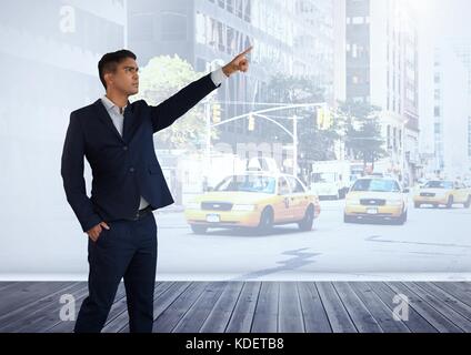 Digital composite de Businessman calling un taxi Banque D'Images