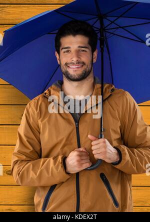 Digital composite de l'homme contre le bois avec parasol et enduire Banque D'Images