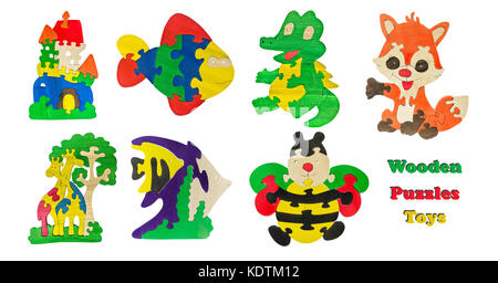 Un ensemble de jouets en bois de l'enfant isolé sur fond blanc. en bois jouets puzzles collage. Banque D'Images