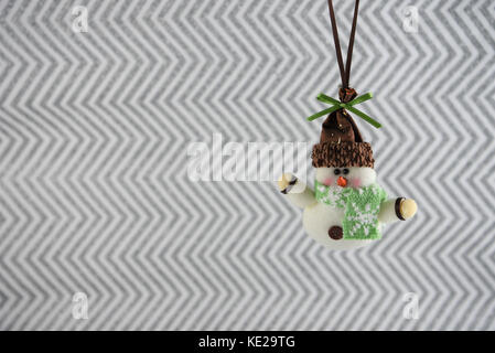 Noël en couleurs photographie image de Noël la décoration de cute snowman avec motif silver glitter background papier d'emballage pour Noël Banque D'Images