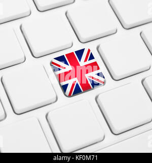 Langue anglaise ou uk web concept. pavillon britannique touche ou sur clavier blanc Banque D'Images