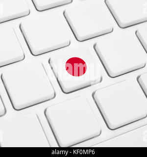 La langue japonaise ou le Japon web concept. drapeau national touche ou sur clavier blanc Banque D'Images