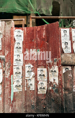 Philippines, Manille, scène de rue à China Town, le quartier de binando, signe politique Banque D'Images