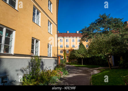 Coopérative de logements destinés aux familles ouvrières construite en 1926 en style néo-classique autour d'un jardin commun, Södermalm, à Stockholm, Suède Banque D'Images