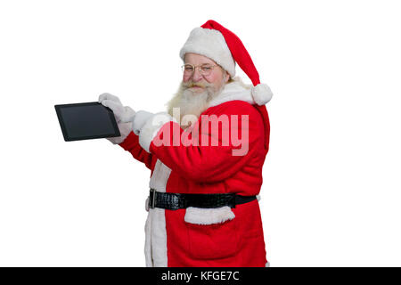 Père Noël avec l'ordinateur tablette. hauts santa claus holding digital tablet ordinateur et en pointant sur l'écran tactile blanc avec index, white backg Banque D'Images