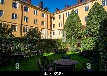 Coopérative de logements destinés aux familles ouvrières construite en 1926 en style néo-classique autour d'un jardin commun, Södermalm, à Stockholm, Suède Banque D'Images