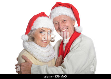 Senior couple in santa hats Banque D'Images