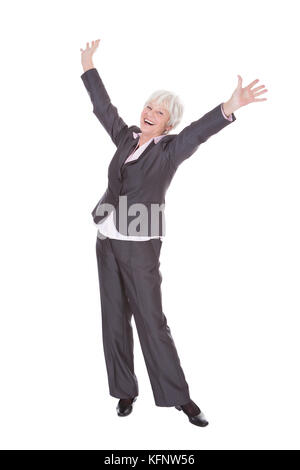 Portrait Of Happy Young Businesswoman Standing Over White Background Banque D'Images