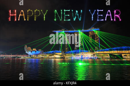 Bonne année firework sparkle avec Singapour ville la nuit avec show laser à Marina Bay water front Banque D'Images