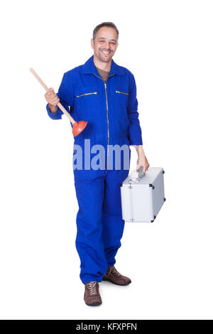 Happy Plumber Holding plongeur sur fond blanc Banque D'Images