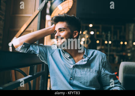 Portrait of young man in blue shirt Banque D'Images