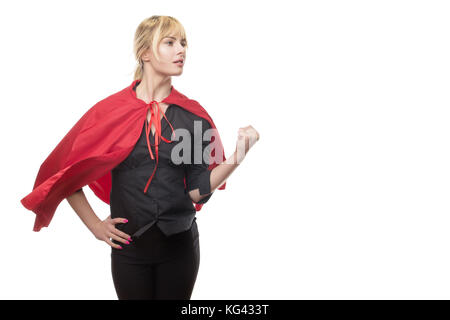 Femme d'affaires aux cheveux blonds porter une cape de super-héros prêt à tout Banque D'Images