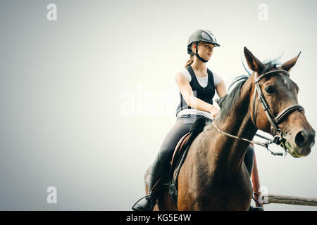 Photo de jeune fille son cheval équitation Banque D'Images