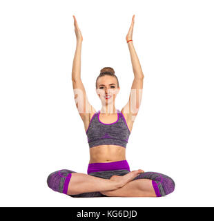 Les femmes qui ne le yoga effectuer assis en lotus poser sur le sol avec plusieurs mains. Banque D'Images