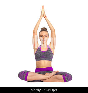 Les femmes qui ne le yoga effectuer assis en lotus poser sur le sol avec plusieurs mains. Banque D'Images