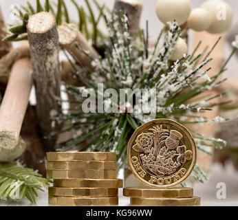 L'argent de Noël un pièces livre Banque D'Images