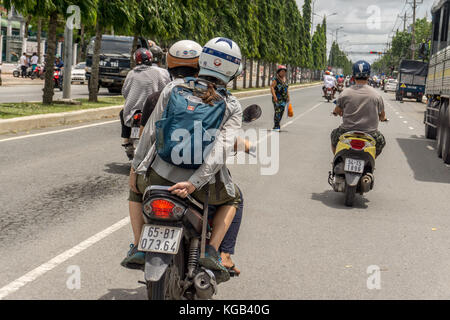 Équitation sur des motos à Can Tho Banque D'Images