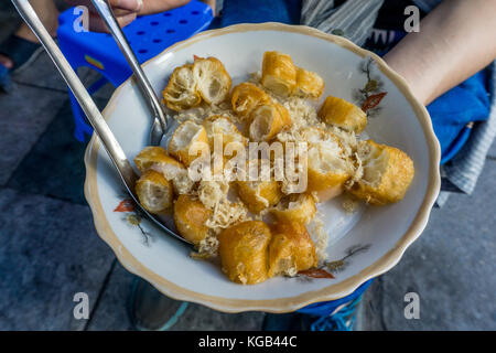 Street Food - Chao Suon Quay (côtelette de riz) Banque D'Images