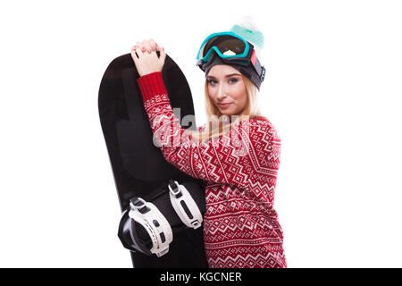 Jolie jeune fille dans la maison chandail avec snowboard Banque D'Images