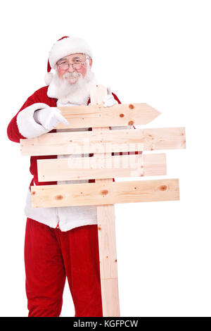 Père Noël authentique orientée en avant, lui chanter en bois isolé sur fond blanc Banque D'Images