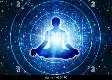 Silhouette d'un homme dans la pose de Lotus de yoga Banque D'Images