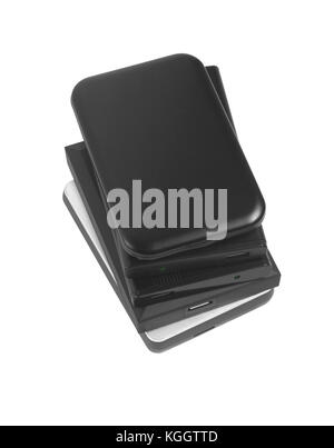 Pile de disques durs externes de l'ordinateur sur fond blanc Banque D'Images