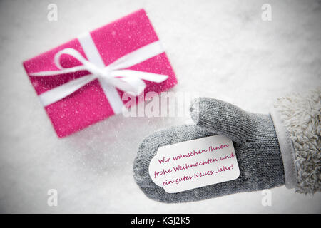 Cadeau rose, gant, gutes neues jahr, happy new year, snowflakes Banque D'Images