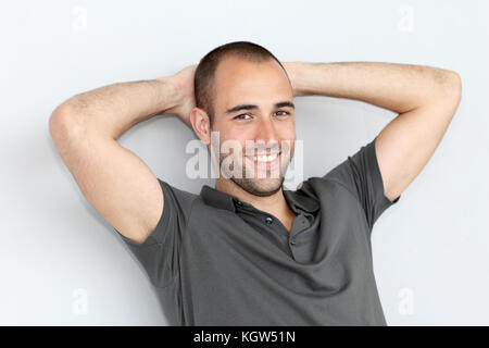 Portrait d'ambiance man leaning on wall Banque D'Images