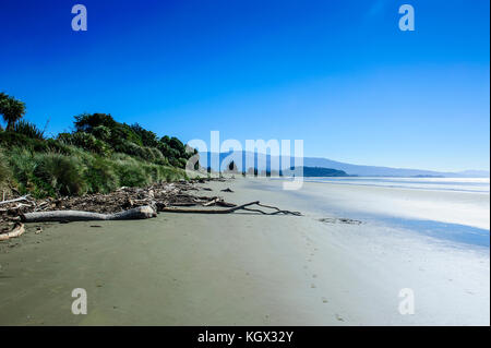 Longue plage de sable, parc national abel tasman, île du Sud, Nouvelle-Zélande Banque D'Images