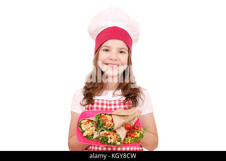 Happy little girl cook avec burritos Banque D'Images