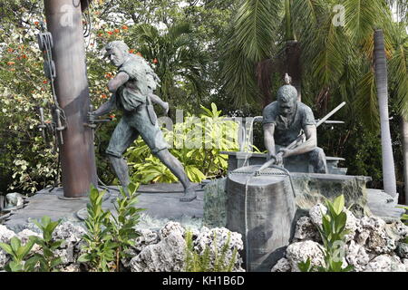 Wreckers décrite dans le quartier historique de Key West Memorial Sculpture Garden, Key West, Floride Banque D'Images