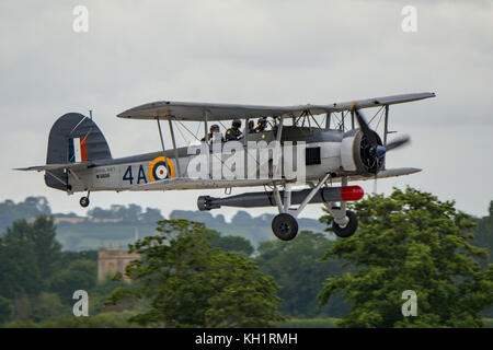 Une Marine royale britannique Bombardier-torpilleur/Espadon fait une approche à l'atterrissage à l'air, Journée internationale de Yeovilton Royaume-uni le 11 juillet 2015. Banque D'Images