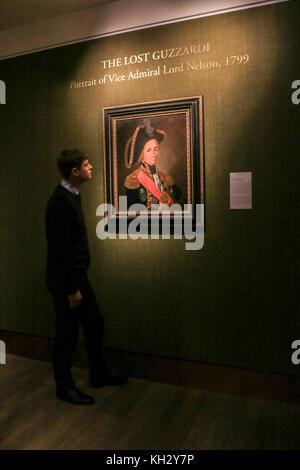 Londres, Royaume-Uni. 13 novembre, 2017. Le portrait de perdu guzzardi vice amiral Lord Nelson s'expose à la philip mould Gallery de Londres après qu'elle a été restaurée montrant l'amiral Lord Nelson, cicatrices du visage et l'absence de sourcil qu'il a subies à la bataille du Nil en 1798 la lutte contre la flotte française de Napoléon. La peinture a été redécouvert à partir d'une collection privée américaine par un marchand d'art et de l'intervenant programme bbc fake ou fortune, et avait déjà été repeints qui inclus l'enlèvement de peinture qui avaient couvert jusqu'Lord Nelson, crédit imperfections : amer ghazzal/Alamy live news Banque D'Images