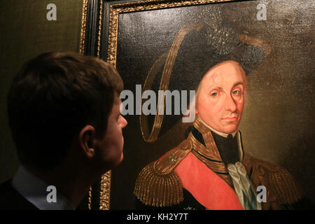 Londres, Royaume-Uni. 13 novembre, 2017. Le portrait de perdu guzzardi vice amiral Lord Nelson s'expose à la philip mould Gallery de Londres après qu'elle a été restaurée montrant l'amiral Lord Nelson, cicatrices du visage et l'absence de sourcil qu'il a subies à la bataille du Nil en 1798 la lutte contre la flotte française de Napoléon. La peinture a été redécouvert à partir d'une collection privée américaine par un marchand d'art et de l'intervenant programme bbc fake ou fortune, et avait déjà été repeints qui inclus l'enlèvement de peinture qui avaient couvert jusqu'Lord Nelson, crédit imperfections : amer ghazzal/Alamy live news Banque D'Images