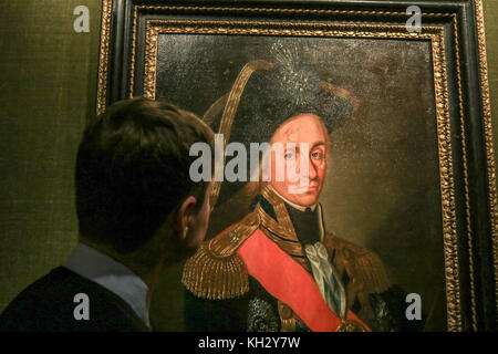 Londres, Royaume-Uni. 13 novembre, 2017. Le portrait de perdu guzzardi vice amiral Lord Nelson s'expose à la philip mould Gallery de Londres après qu'elle a été restaurée montrant l'amiral Lord Nelson, cicatrices du visage et l'absence de sourcil qu'il a subies à la bataille du Nil en 1798 la lutte contre la flotte française de Napoléon. La peinture a été redécouvert à partir d'une collection privée américaine par un marchand d'art et de l'intervenant programme bbc fake ou fortune, et avait déjà été repeints qui inclus l'enlèvement de peinture qui avaient couvert jusqu'Lord Nelson, crédit imperfections : amer ghazzal/Alamy live news Banque D'Images