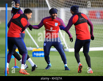 De gauche à droite, Marcus Rashford, Jesse Lingard, Danny Rose et Ashley Young pendant une séance d'entraînement au terrain d'entraînement d'Enfield, Londres. Banque D'Images