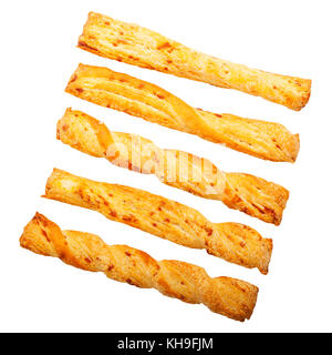 Pailles au fromage sur un fond blanc Banque D'Images