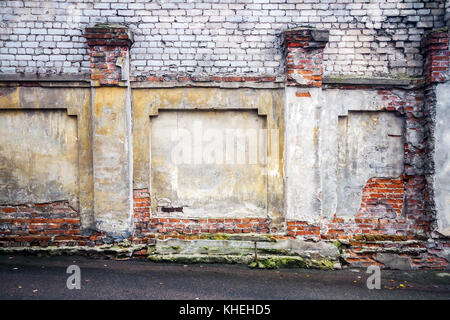 Old weathered mur de briques et une masse Banque D'Images