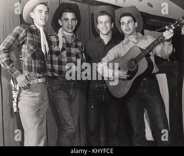 Quatre étudiants avec guitare Banque D'Images