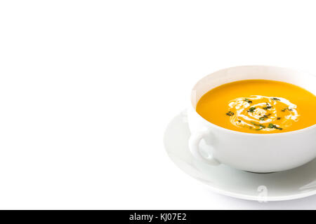 Soupe de potiron au bol blanc sur la table en bois Banque D'Images