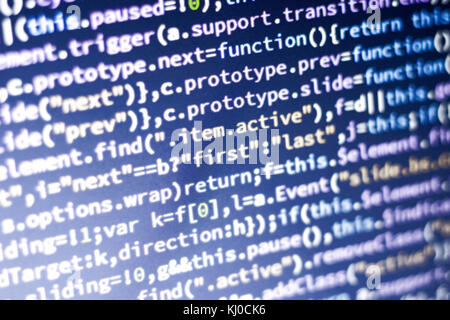 Minificated rougeoyant du code javascript. Résumé de l'écran. développeur web moderne hacking réseau informatique. Banque D'Images