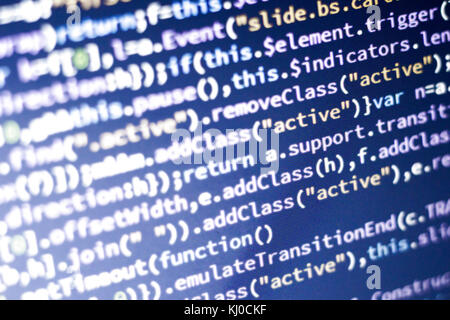 Minificated rougeoyant du code javascript. Résumé de l'écran. développeur web moderne hacking réseau informatique. Banque D'Images